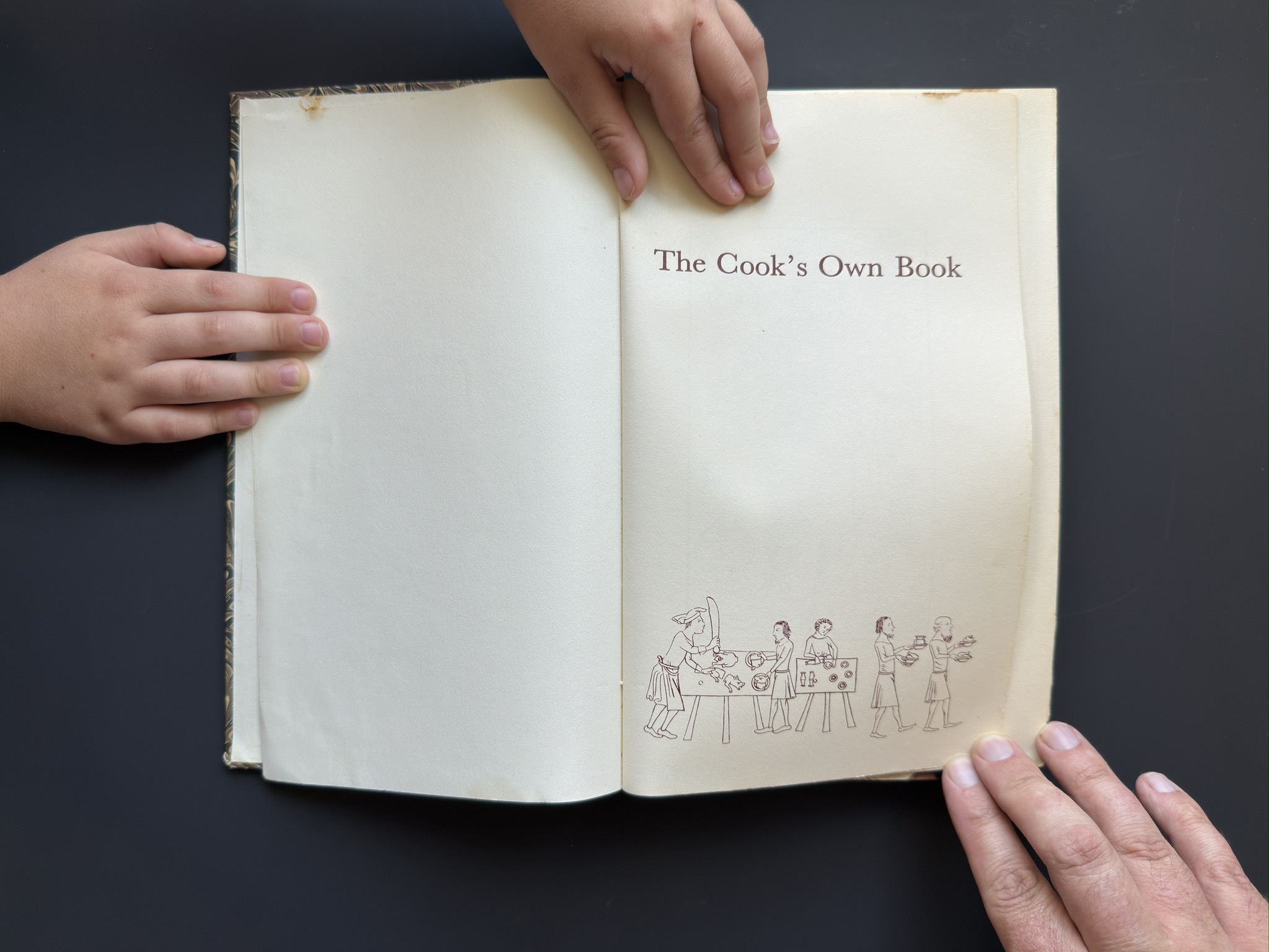 The Cook's Own Book lying open to its half-title page